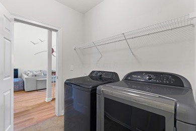 This Powell condo isn't just a home, it's a lifestyle upgrade! on Scioto Reserve Golf and Athletic Club in Ohio - for sale on GolfHomes.com, golf home, golf lot