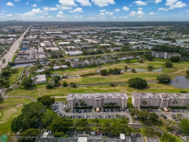Experience the best of Florida living in this stunning home on Palm-Aire Country Club and Resort - Palms in Florida - for sale on GolfHomes.com, golf home, golf lot