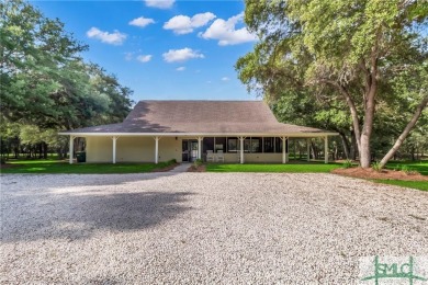 Welcome to the exclusive gated community of Coopers Point, where on Sapelo Hammock Golf Club in Georgia - for sale on GolfHomes.com, golf home, golf lot