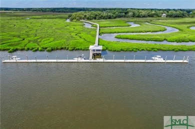 Welcome to the exclusive gated community of Coopers Point, where on Sapelo Hammock Golf Club in Georgia - for sale on GolfHomes.com, golf home, golf lot
