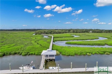 Welcome to the exclusive gated community of Coopers Point, where on Sapelo Hammock Golf Club in Georgia - for sale on GolfHomes.com, golf home, golf lot