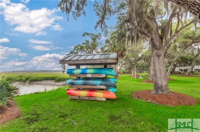 Welcome to the exclusive gated community of Coopers Point, where on Sapelo Hammock Golf Club in Georgia - for sale on GolfHomes.com, golf home, golf lot