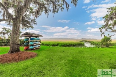 Welcome to the exclusive gated community of Coopers Point, where on Sapelo Hammock Golf Club in Georgia - for sale on GolfHomes.com, golf home, golf lot