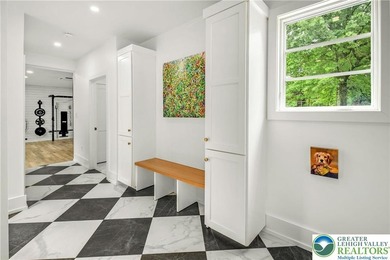 This STUNNING ESTATE is located within the single square mile of on  in Pennsylvania - for sale on GolfHomes.com, golf home, golf lot