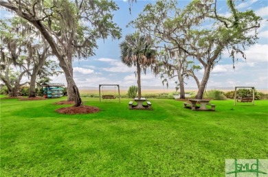 Welcome to the exclusive gated community of Coopers Point, where on Sapelo Hammock Golf Club in Georgia - for sale on GolfHomes.com, golf home, golf lot