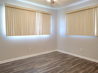 Under contract-accepting backup offers. FRESHLY PAINTED 2/11/25! on Mainlands Golf Club in Florida - for sale on GolfHomes.com, golf home, golf lot