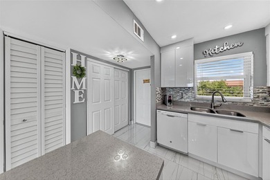 Beautifully renovated 2-bedroom, 2-bath condo located in the on Sunrise Lakes Phase III in Florida - for sale on GolfHomes.com, golf home, golf lot