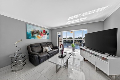 Beautifully renovated 2-bedroom, 2-bath condo located in the on Sunrise Lakes Phase III in Florida - for sale on GolfHomes.com, golf home, golf lot