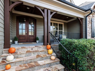 Main Floor Primary & In-Law Suite: Nestled beautifully among the on Heritage Golf Club in North Carolina - for sale on GolfHomes.com, golf home, golf lot