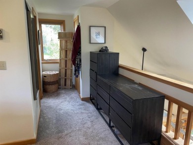 Discover this delightful end-unit townhouse, perfectly situated on Hermitage Club Golf Course in Vermont - for sale on GolfHomes.com, golf home, golf lot