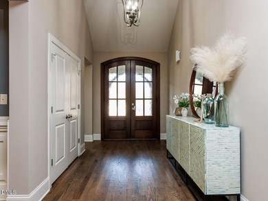 Main Floor Primary & In-Law Suite: Nestled beautifully among the on Heritage Golf Club in North Carolina - for sale on GolfHomes.com, golf home, golf lot