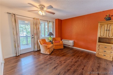 Located in the iconic Tan Tar A Estates, just steps from on The Oaks Golf Course in Missouri - for sale on GolfHomes.com, golf home, golf lot