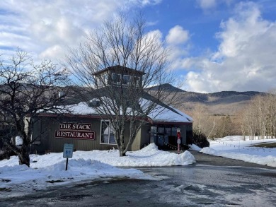 Discover this delightful end-unit townhouse, perfectly situated on Hermitage Club Golf Course in Vermont - for sale on GolfHomes.com, golf home, golf lot