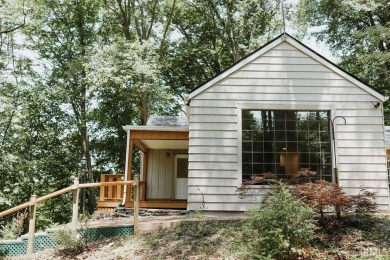Welcome to your dream woodland cottage tucked away on 1.5 serene on Forest Hills Country Club in Indiana - for sale on GolfHomes.com, golf home, golf lot