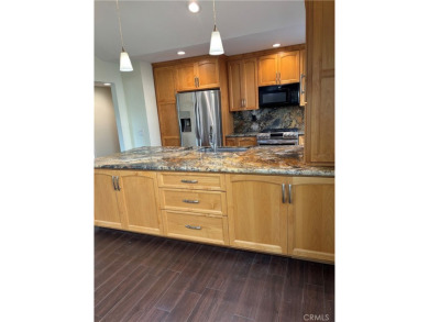 Cozy single story home in the much sought after El Camino on Ocean Hills Country Club in California - for sale on GolfHomes.com, golf home, golf lot