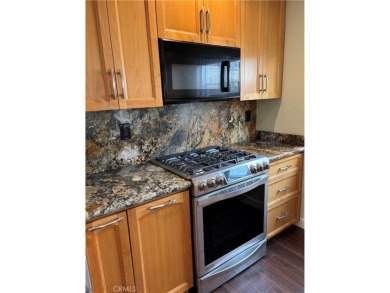 Cozy single story home in the much sought after El Camino on Ocean Hills Country Club in California - for sale on GolfHomes.com, golf home, golf lot