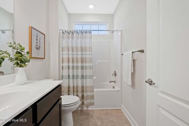 Welcome to the ''Boardwalk'' a beautifully designed one-level on Sound Golf Links at Albemarle Plantation in North Carolina - for sale on GolfHomes.com, golf home, golf lot