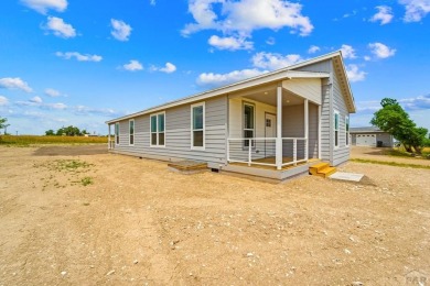 Experience modern country living with breathtaking mountain on Hollydot Golf Course in Colorado - for sale on GolfHomes.com, golf home, golf lot