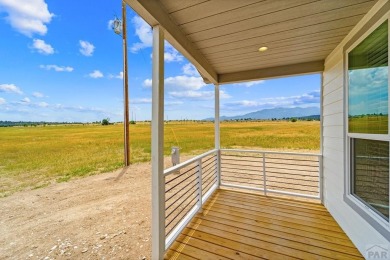 Experience modern country living with breathtaking mountain on Hollydot Golf Course in Colorado - for sale on GolfHomes.com, golf home, golf lot
