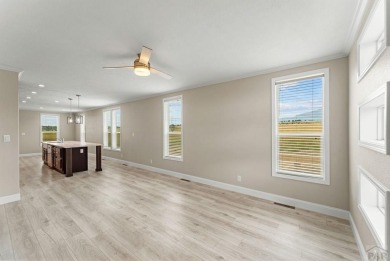 Experience modern country living with breathtaking mountain on Hollydot Golf Course in Colorado - for sale on GolfHomes.com, golf home, golf lot