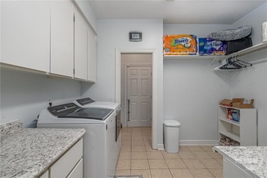 Tucked away on a quiet, private lot with unobstructed marsh and on The Landings Club - Oakridge in Georgia - for sale on GolfHomes.com, golf home, golf lot