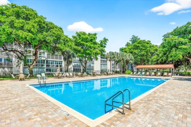 CORNER UNIT!   Windows are in the main and 2nd bedroom on Wynmoor Golf Course in Florida - for sale on GolfHomes.com, golf home, golf lot