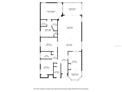 Walk up as you take in the lush landscape and brick paved front on East Lake Woodlands Country Club in Florida - for sale on GolfHomes.com, golf home, golf lot