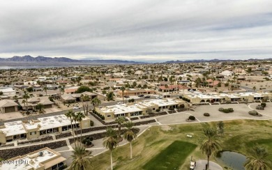 This beautifully remodeled condo offers unparalleled views on London Bridge Golf Course in Arizona - for sale on GolfHomes.com, golf home, golf lot