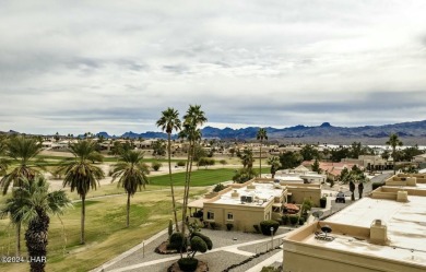 This beautifully remodeled condo offers unparalleled views on London Bridge Golf Course in Arizona - for sale on GolfHomes.com, golf home, golf lot