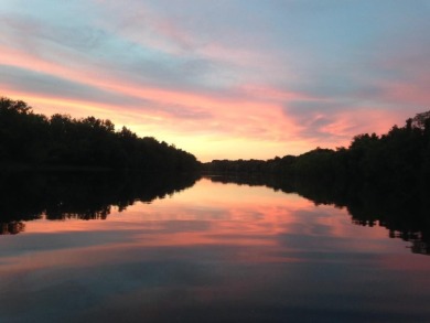 Enjoy sunset views on the Merrimack River with your private dock on Passaconaway Country Club in New Hampshire - for sale on GolfHomes.com, golf home, golf lot