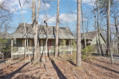 Welcome home to this charming Mountain Cottage. Nestled in the on Big Canoe Golf Club - Cherokee in Georgia - for sale on GolfHomes.com, golf home, golf lot