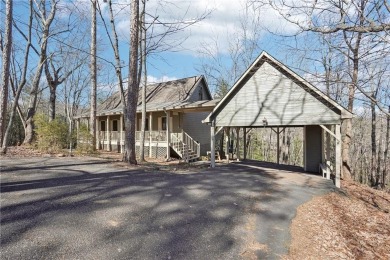 Welcome home to this charming Mountain Cottage. Nestled in the on Big Canoe Golf Club - Cherokee in Georgia - for sale on GolfHomes.com, golf home, golf lot