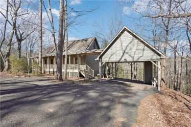 Welcome home to this charming Mountain Cottage. Nestled in the on Big Canoe Golf Club - Cherokee in Georgia - for sale on GolfHomes.com, golf home, golf lot