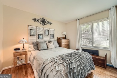 Welcome home to this beautiful contemporary with SEASONAL LAKE on The Highlands Course at Lake Arrowhead in Georgia - for sale on GolfHomes.com, golf home, golf lot