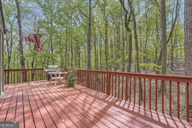 Welcome home to this beautiful contemporary with SEASONAL LAKE on The Highlands Course at Lake Arrowhead in Georgia - for sale on GolfHomes.com, golf home, golf lot