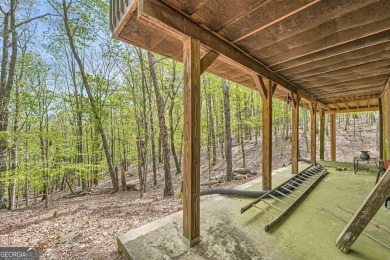 Welcome home to this beautiful contemporary with SEASONAL LAKE on The Highlands Course at Lake Arrowhead in Georgia - for sale on GolfHomes.com, golf home, golf lot
