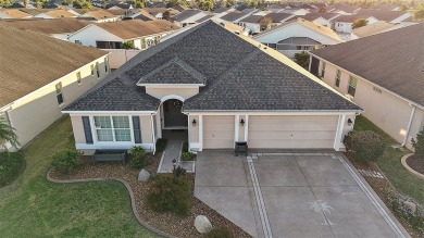 Not your average Designer Home! This 3/2 Iris model, located in on The Links of Spruce Creek in Florida - for sale on GolfHomes.com, golf home, golf lot