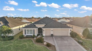 Not your average Designer Home! This 3/2 Iris model, located in on The Links of Spruce Creek in Florida - for sale on GolfHomes.com, golf home, golf lot