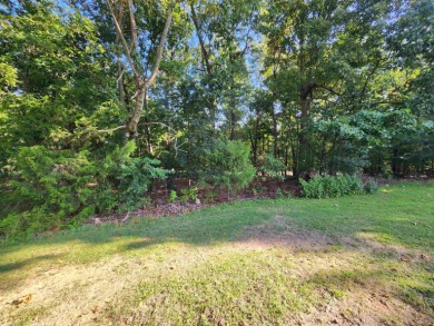 This is a must-see gorgeous Corner Lot- Golf Course Lot, backing on Cherokee Village South Course in Arkansas - for sale on GolfHomes.com, golf home, golf lot