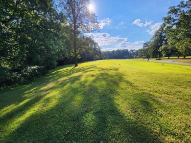 This is a must-see gorgeous Corner Lot- Golf Course Lot, backing on Cherokee Village South Course in Arkansas - for sale on GolfHomes.com, golf home, golf lot