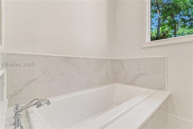 This beautiful completely remodeled residence is perfectly on The Golf Club at Indigo Run in South Carolina - for sale on GolfHomes.com, golf home, golf lot