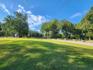 This is a must-see gorgeous Corner Lot- Golf Course Lot, backing on Cherokee Village South Course in Arkansas - for sale on GolfHomes.com, golf home, golf lot