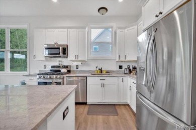 Skip the hassle of building and move right into this like-new on Metamora Country Club in Michigan - for sale on GolfHomes.com, golf home, golf lot