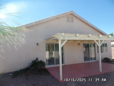 Fairway Estates home, with front landscaping and mature palm on Desert Lakes Golf Course in Arizona - for sale on GolfHomes.com, golf home, golf lot