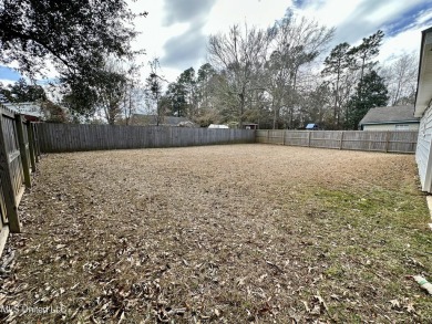 Precious four bedroom two bathroom single family home appointed on Diamondhead Country Club in Mississippi - for sale on GolfHomes.com, golf home, golf lot