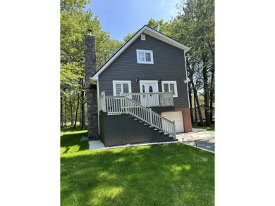 Welcome to your dream home! This gorgeous, contemporary on Pocono Farms Country Club in Pennsylvania - for sale on GolfHomes.com, golf home, golf lot
