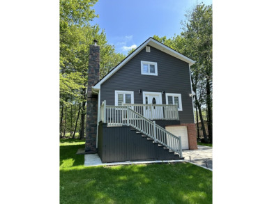 Welcome to your dream home! This gorgeous, contemporary on Pocono Farms Country Club in Pennsylvania - for sale on GolfHomes.com, golf home, golf lot