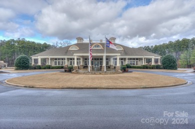Indulge in comfort w/this wonderful home featuring beautiful on The Tillery Tradition Country Club in North Carolina - for sale on GolfHomes.com, golf home, golf lot