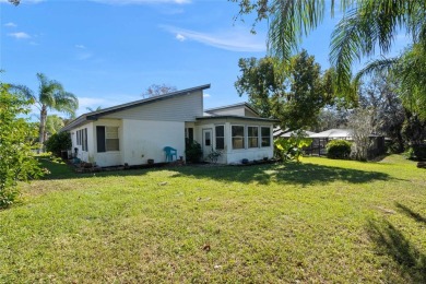 Discover your peaceful retreat in this charming two-bedroom on Sun Air Golf Course in Florida - for sale on GolfHomes.com, golf home, golf lot