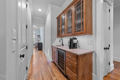 This 4 bedroom, 4 and a half-bath home offers over 170 feet of on TPC at Wakefield Plantation in North Carolina - for sale on GolfHomes.com, golf home, golf lot